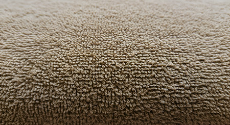 Close up of beige towel texture for background. Soft focus.の素材