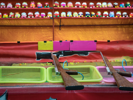 toy guns at a Temple Fair in Bangkok , Thailandの写真素材