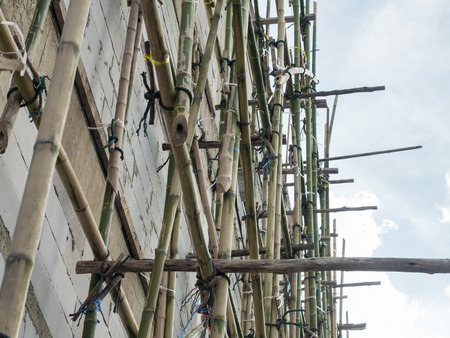 bamboo scaffolding in construction site, bangkok thailandの写真素材