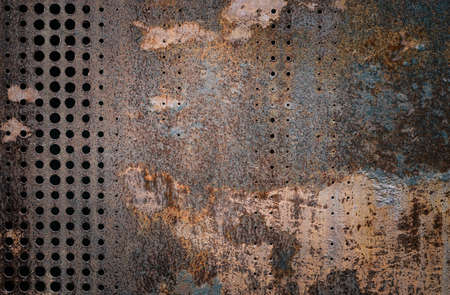 The vintag rusty grunge steel decorated by drilling a wall textured background