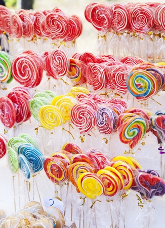 Many sweet and colorful candy placed for saleの写真素材