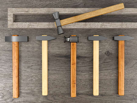 Hammer set lying on old wood backgroundの写真素材