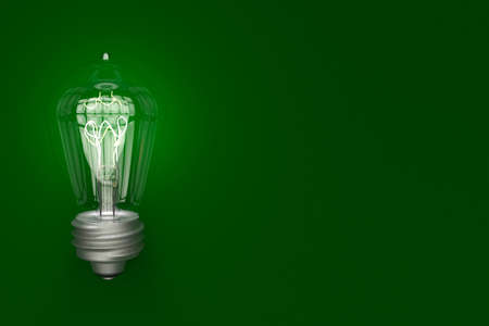 Vintage light bulbs glowing on green background with space, stock imageの写真素材