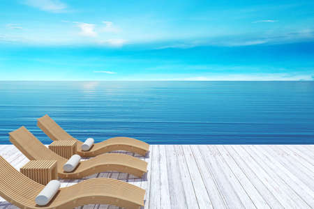 Beach lounge, sundeck over blue sea and sky, summer beach holiday vacation conceptの写真素材