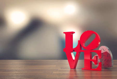 Love message with heart jigsaw and blur background for Valentine's dayの写真素材