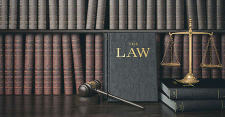 Low key filter law bookshelf with wooden judge's gavel and golden scale , 3D Renderingの写真素材