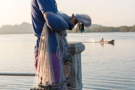 Muslim Fisherman Fishing Nets,Andaman Sea off the coast, Ranong Southern Thailandの写真素材