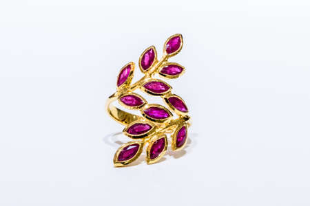 Leaf shape, Gold ring with Ruby on white backgroundの写真素材