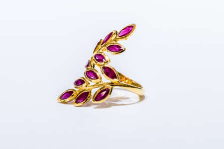 Leaf shape, Gold ring with Ruby on white backgroundの写真素材