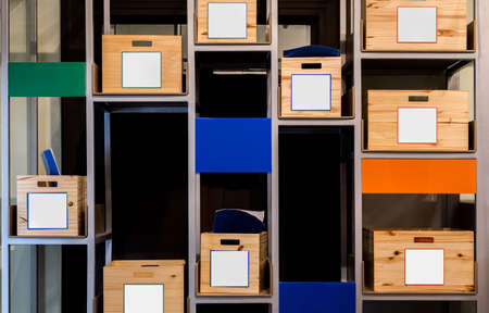 Wood boxes on shelves in Storage roomの写真素材