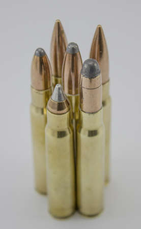 bullets lined up to form a powerful six