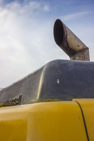 Exhaust pipe on the top of a vehicle