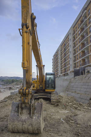 excavator at construction site, heavy construction machineの写真素材