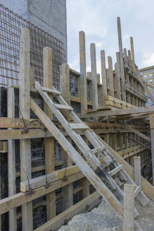 Construction of a new Retaining Concrete Wall at Construction Site. Preparing to pour concrete.