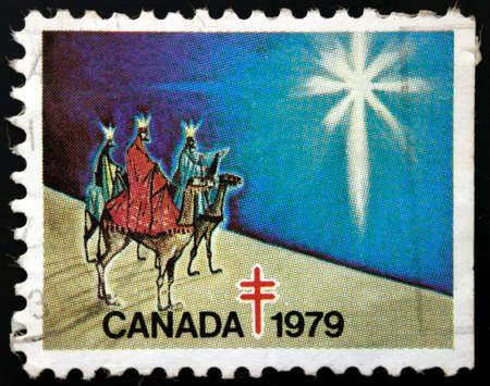 Stamp printed in Canada shows three camel riders with the crownsの写真素材
