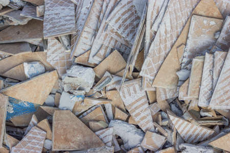 garbage broken tiles background at the construction siteの写真素材