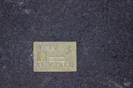 Caution electric cable below. Cable Identification Tile for the protection and location of electric cables.の写真素材