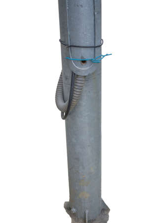 Two wires were installed on to the lugs that the electric utility uses for the street sighting pole supply. Electrical connection directly to the main electricity supply cable bypassing the meter.の写真素材