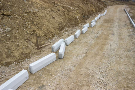 construction of new sidewalk on building siteの写真素材