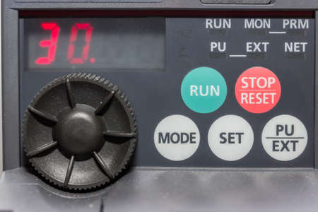 Close of industrial machine operator panel. Selective focus.の写真素材