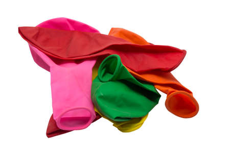 Deflated rubber balloons isolated on white with clipping pathの写真素材