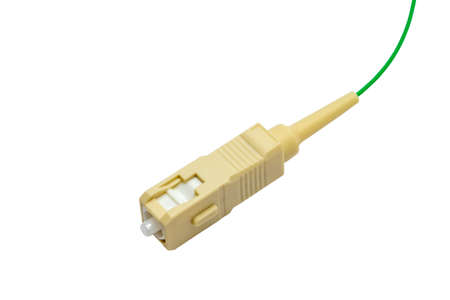 Fiber optics connector with fiber cable isolated on white backgroundの写真素材