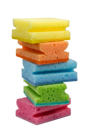Stack of scrubbing sponges, washing sponges isolated on whiteの写真素材