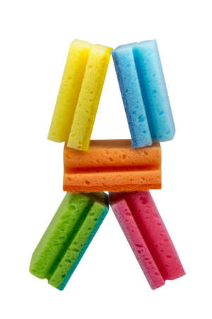 Alphabet A letter shaped stack of scrubbing sponges, washing sponges isolated on whiteの写真素材