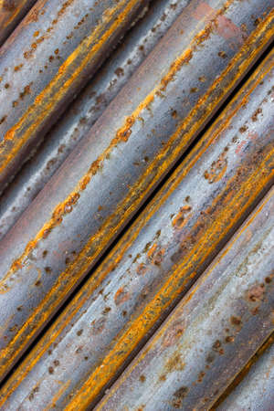 Close of rusty iron rods used to reinforce concrete. Steel bars background.の写真素材