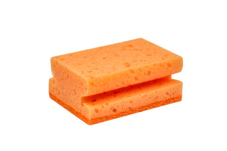 Orange scrubbing sponge, washing sponge isolated on white の写真素材