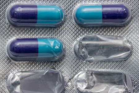 Close up of used pack of antibiotic pills background.の写真素材