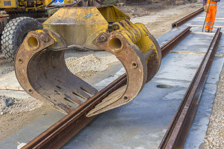 Alignment of tram rail track  before welding. Installation of tram tracks. Assembling a tram rail track.の写真素材