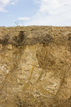 Cross section of dirt, dirt background after working excavatorの写真素材