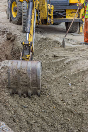 Backfill a trench, works to backfill the trench after laying pipeline at construction siteの写真素材