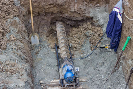 boring tool and drilling under street for sewer pipesの写真素材