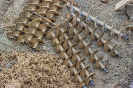 drilling augers after dirt drill,  used to drilling under street for sewer pipesの写真素材