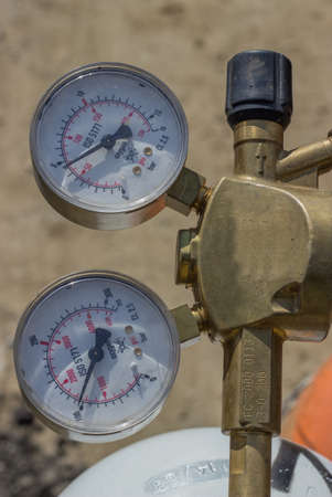 Dual pressure gauges of oxy acetylene tanks, pressure regulator
