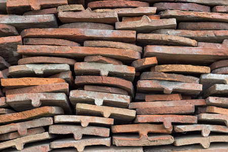 heap of old terracotta tile roof background