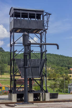 Vintage water crane station for steam locomotives, device used for delivering a large volume of water into the tank or tender of a steam locomotiveの写真素材