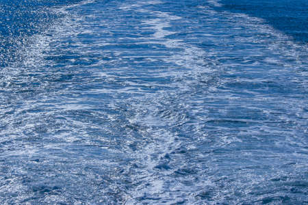 Water pattern behind the stern of the cruise ship. Ship trace.