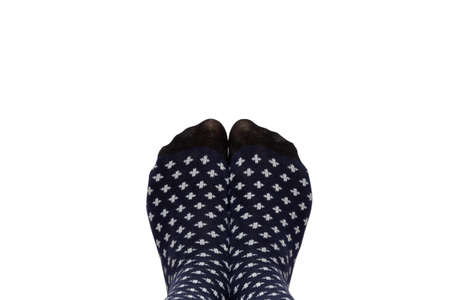 Feet in socks from above with space for your text, isolated on white background.の写真素材