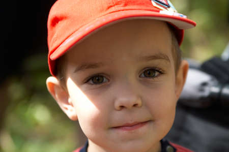 Portrait of the lovely child on fresh airの写真素材