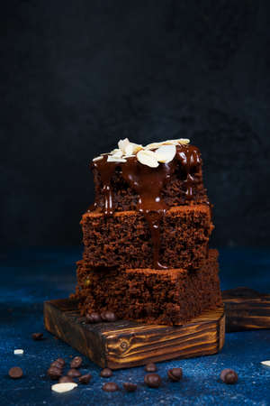 Brownie chocolate cakes on a wooden boardの写真素材