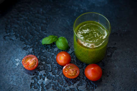 Classic green pesto sauce with Basil, Parmesan, pine nuts and olive oilの写真素材