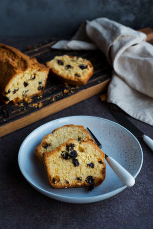 Slices of homemade raisin loaf cake.