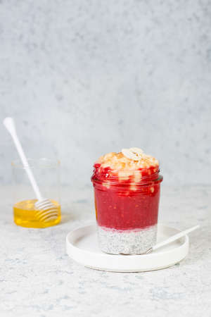 Vegan Chia pudding with berries and milkの写真素材