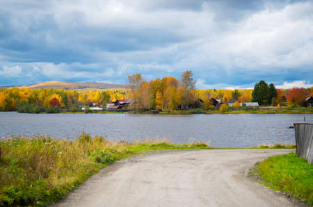 Autumn foliage, rural area in the Urals, autumn landscapeの写真素材