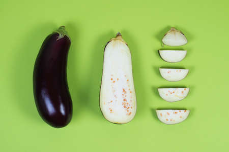 Fresh eggplant on a pastel green background, minimalism の写真素材