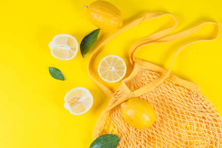 Juicy citrus fruits, lemons on an eco-bag, zero vast の写真素材
