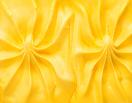 Natural mango ice cream close-up. Mango ice cream background. Top viewの写真素材